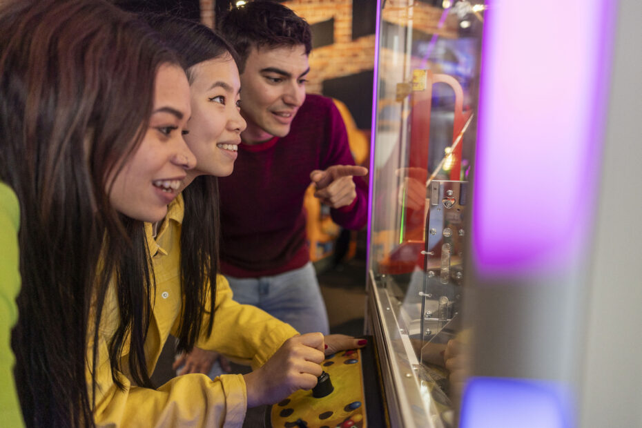 Kids playing arcade games