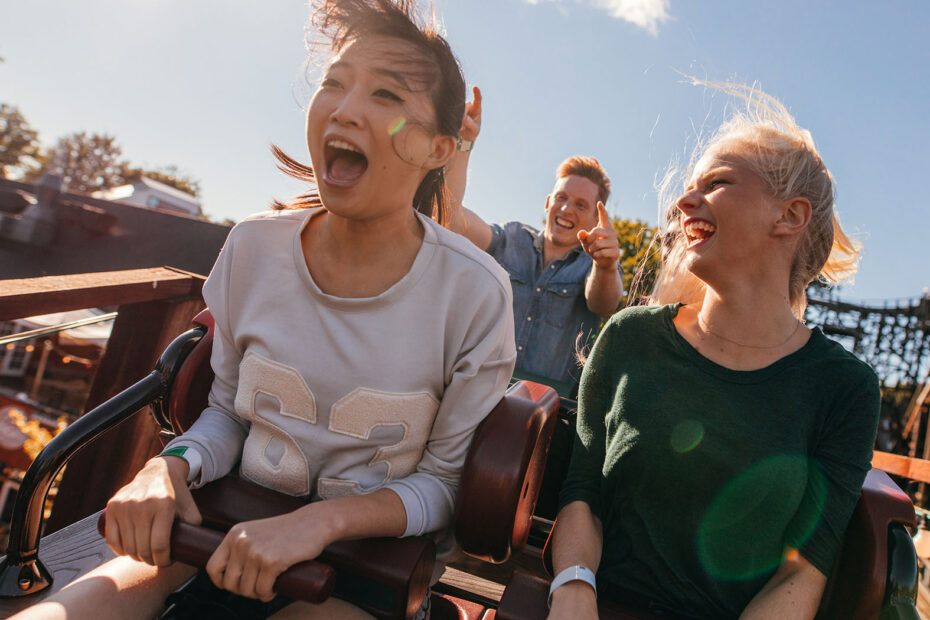 Kids riding roller coaster